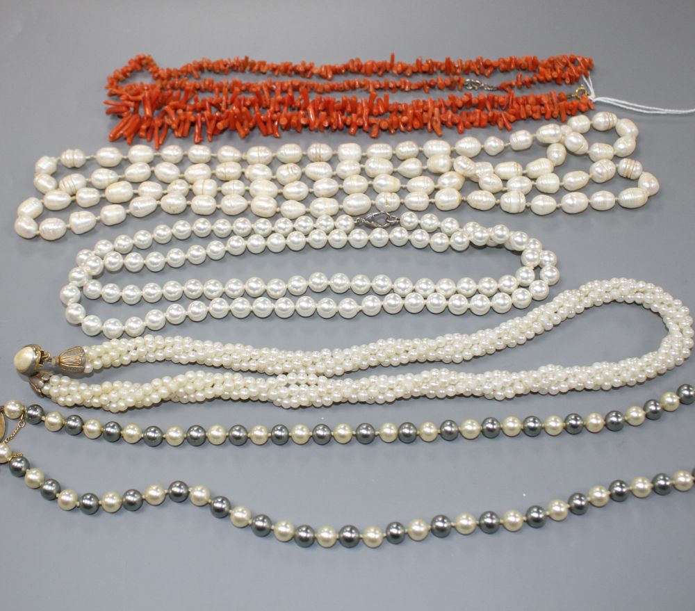 Two coral stick bead necklaces, a freshwater pearl necklace and three other costume necklaces,